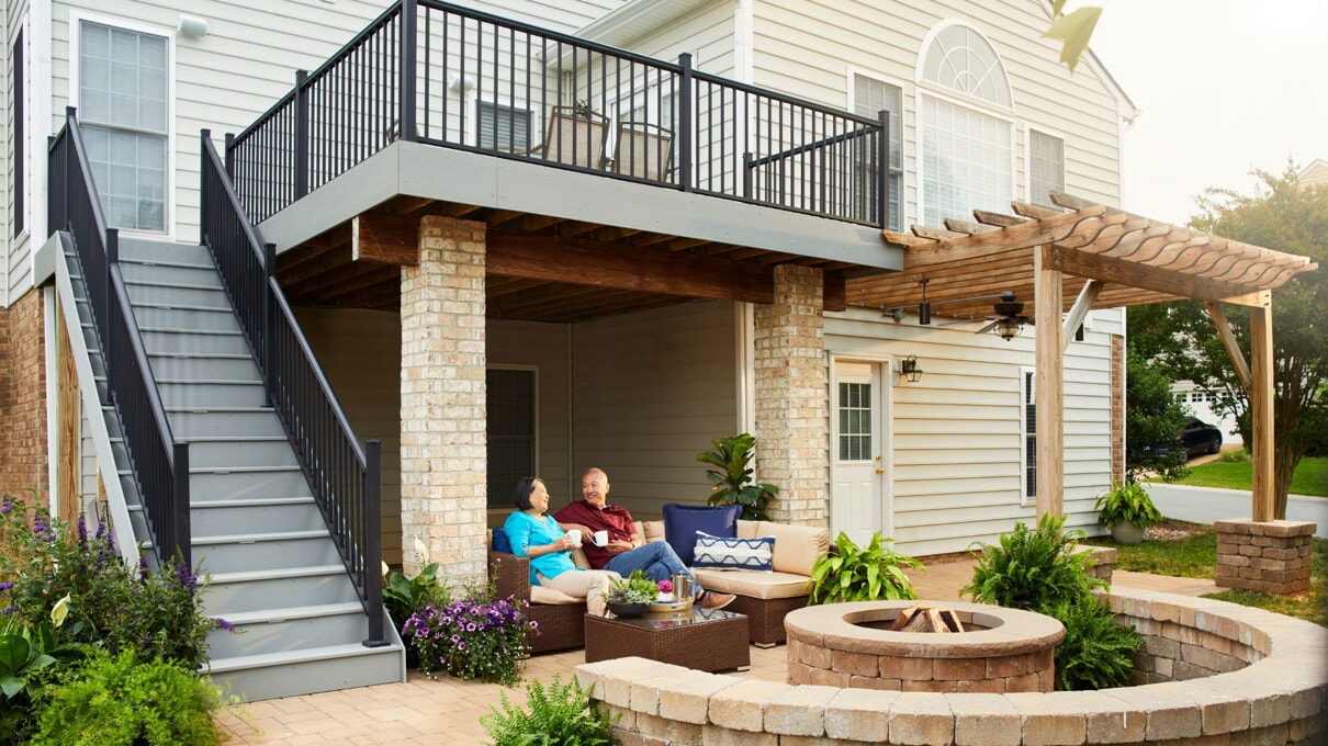 people sitting on their deck
